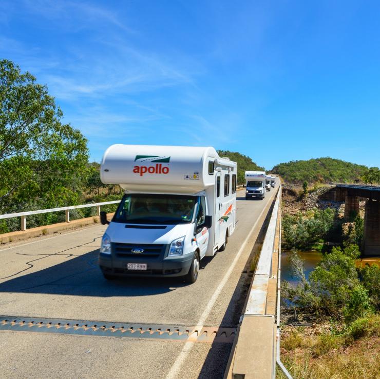 Apollo campervans driving along the Stuart Highway © Tourism NT, Steve Strike