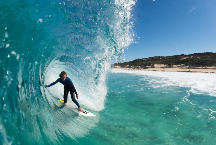 Surfing Margaret River's clear waves, WA © Tourism Western Australia