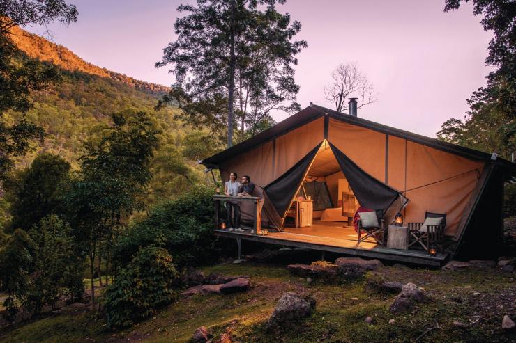 Couple at Nightfall Wilderness Camp in Lamington National Park © Tourism & Events Queensland
