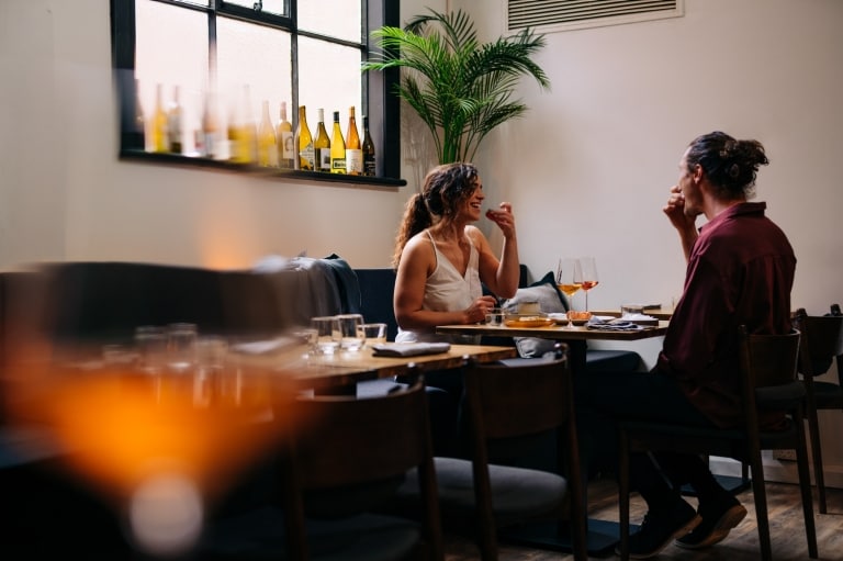 Couple dining at Dier Makr restaurant in Hobart © Osborne Images