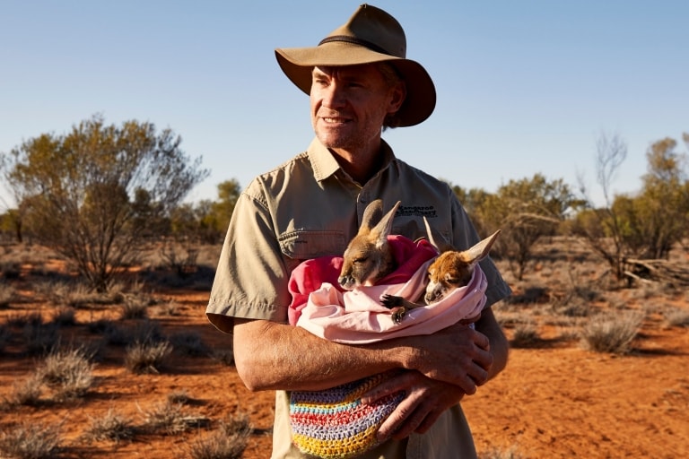 Chris ‘Brolga’ Barns at The Kangaroo Sanctuary in the Northern Territory © Tourism Australia