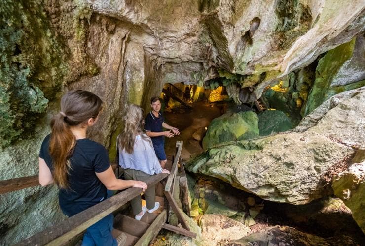 People walking into the Capricorn Caves © Tourism and Events Queensland