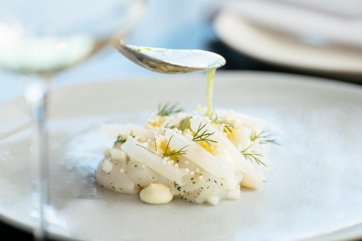 Close up of sauce being slowly poured over a decadent dish at Wildflower, Perth, Western Australia © Wildflower Close up of sauce being slowly poured over a decadent dish at Wildflower, Perth, Western Australia © Wildflower