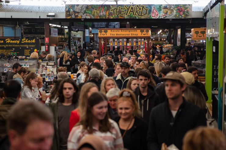 A crowd of people wandering the vendor lined walkways of Fremantle Markets, Fremantle, Western Australia © Tourism Australia A crowd of people wandering the vendor lined walkways of Fremantle Markets, Fremantle, Western Australia © Tourism Australia
