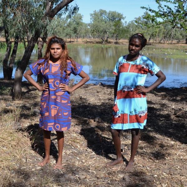 Women wearing textiles created at Ngukurr Arts in Ngukurr © Ngukurr Arts/Alan Joshua and Karen Rogers