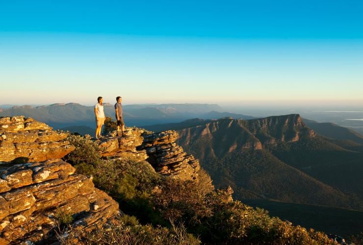 Couple stands on Mt William enjoying a view of the Grampians in Victoria ©  Robert Blackburn