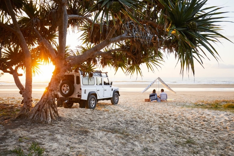 Couple on beach, Fraser Island, Queensland © Tourism & Events Queensland
