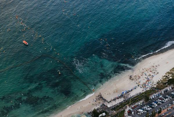 Aerial shot of the Rottnest Channel Swim, Cottesloe Beach, WA © Tourism Western Australia