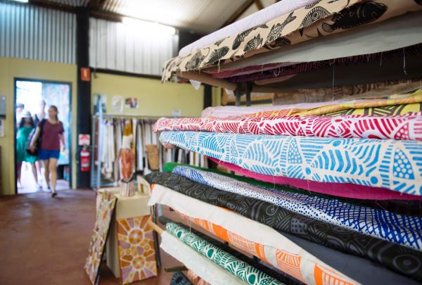 Tourists walking into Tiwi Design in Tiwi Islands © Tourism NT/Shaana McNaught