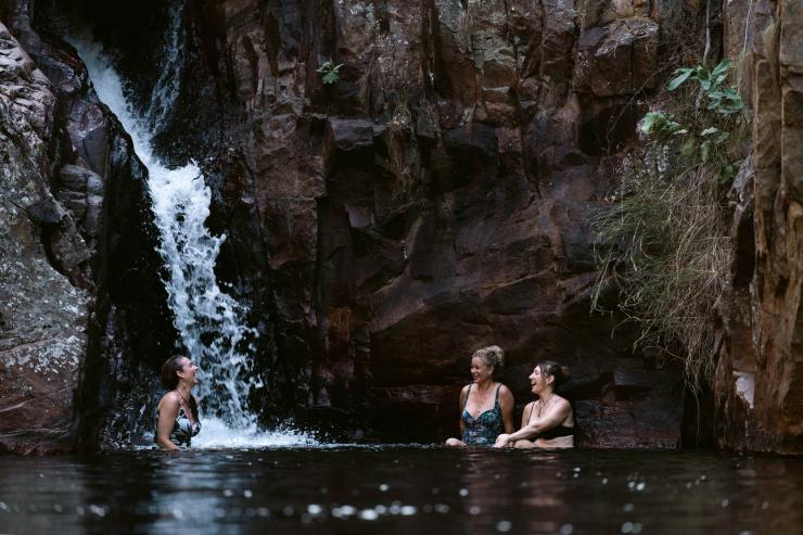 Swimming in a waterfall with Lords Safaris, Top End, Northern Territory © Tourism Australia