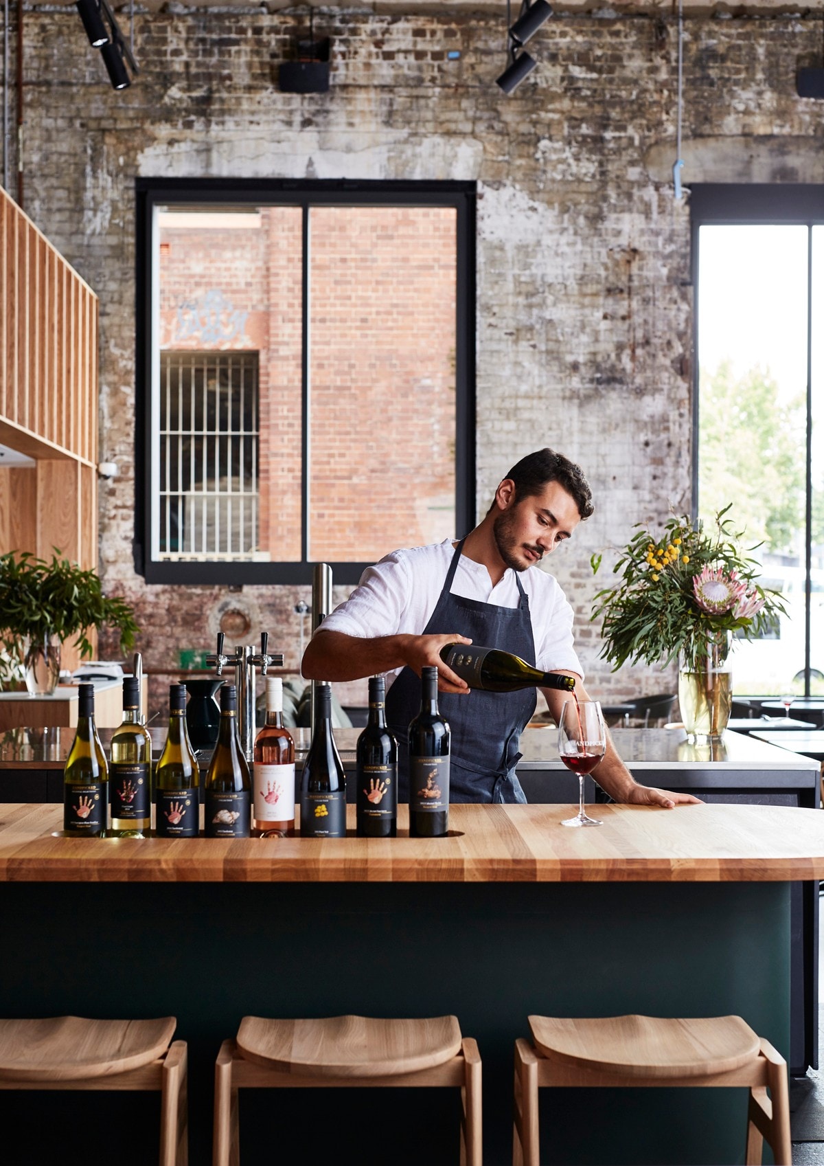 Bartender pouring wine at Handpicked Wines in Sydney © Handpicked Wines