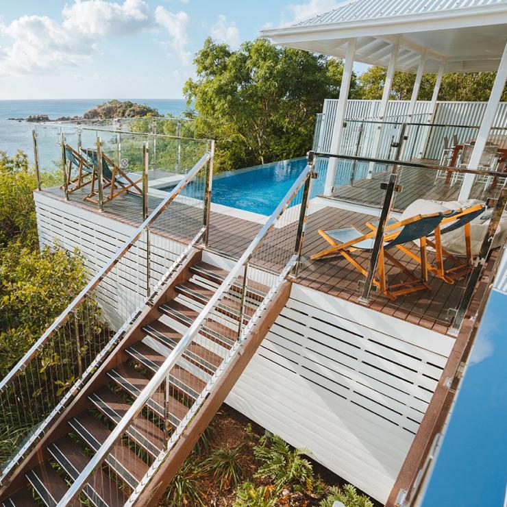 View over the ocean from a villa at Lizard Island Resort © Tourism Australia