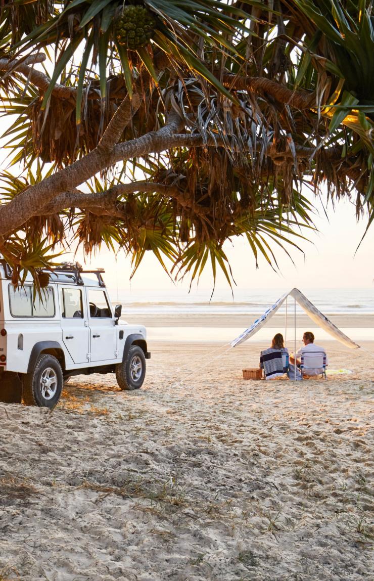 Couple on beach, Fraser Island, Queensland © Tourism and Events Queensland