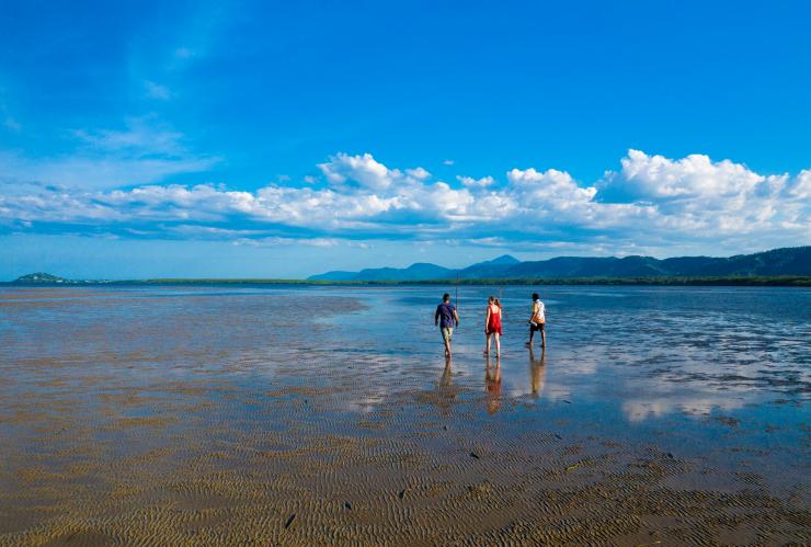 People walking on the beach at Port Douglas © Tourism and Events Queensland