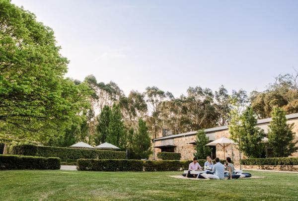 Friends enjoying a picnic on the grass at Golding Wines, Adelaide Hills, South Australia © Adelaide Hills Wine Region