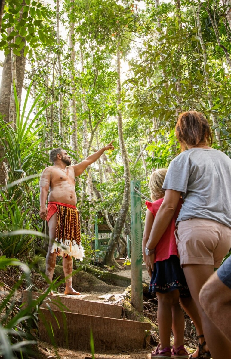 Visitors learning about Indigneous culture on board a Dreamtime Dive and Snorkel boat © Tourism and Events Queensland