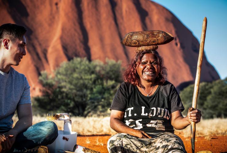 Create your own art piece in the shadow of Uluru with Maruku Arts © Tourism NT/Archie Sartracom