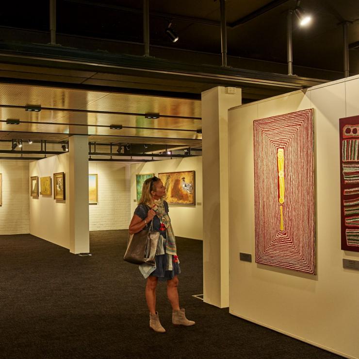 Woman admires artwork at Leeuwin Art Gallery in Margaret River © Leeuwin Estate