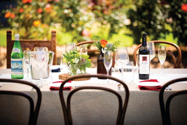 Dining table set with wine at Pizzini Wines © Pizzini Wines