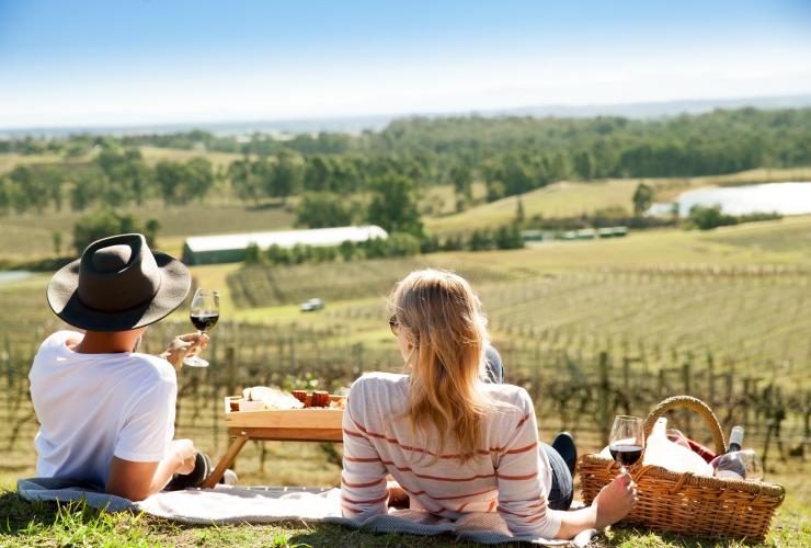 Couple having a picnic at Audrey Wilkinson in Hunter Valley © Audrey Wilkinson