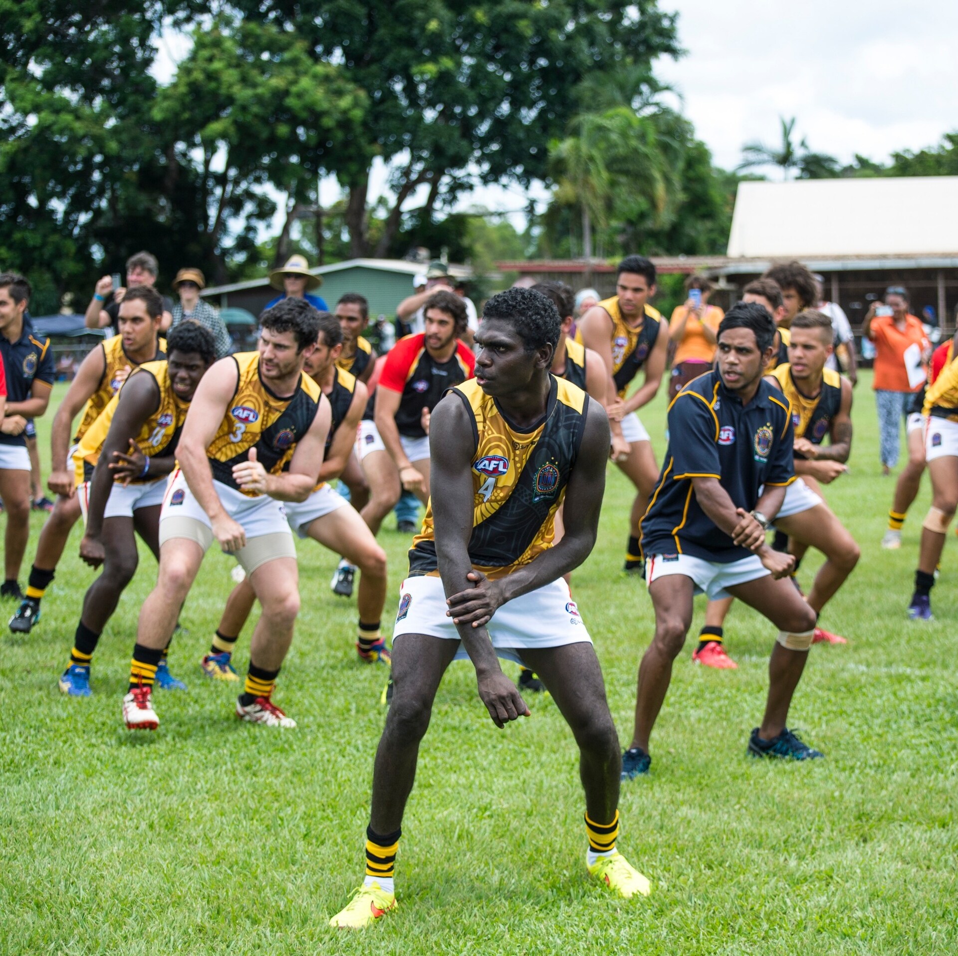 Football players at the Tiwi Islands Grand Final in Tiwi Islands © Tourism NT/Shaana McNaught