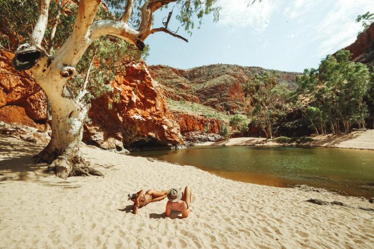 Friends relaxing at Ormiston, West MacDonnell, Northern Territory © Tourism NT/Jordan Hammond 