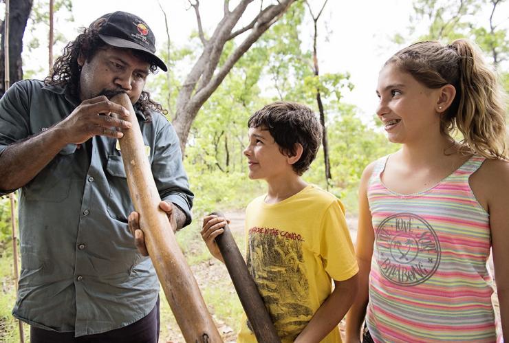 Kids learning to play the didgeridoo on a Pudakul Aboriginal Cultural Tour © Shaana McNaught