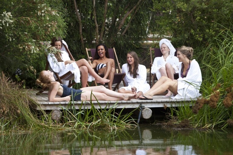 Girls Group relax lakeside at Peninsula Hot Springs, Mornington Peninsula VIC © Visit Victoria