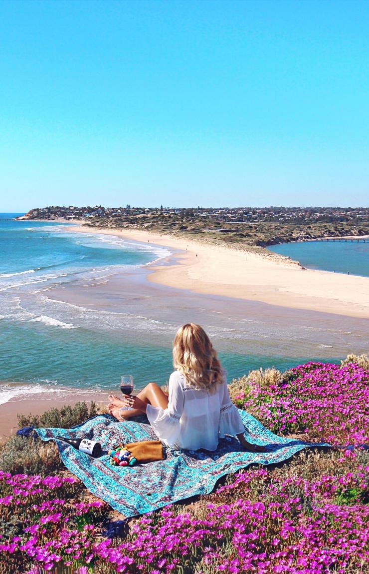 Girl enjoying picnic near the beach on South Australia's Fleurieu Peninsula © Elise Cook