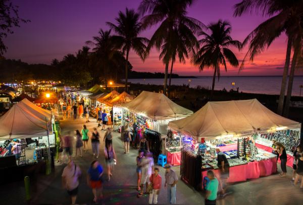 Food stalls lit up at night at the Mindil Beach Sunset Markets, Darwin, Northern Territory © Mindil Beach Markets/Charlie Bliss