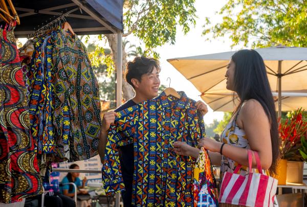 Couple shopping at Parap Markets, Darwin, Northern Territory © Tourism NT