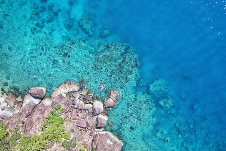 Aerial view of the coastline of Hook Island, Whitsundays, Queensland © Tourism & Events Queensland