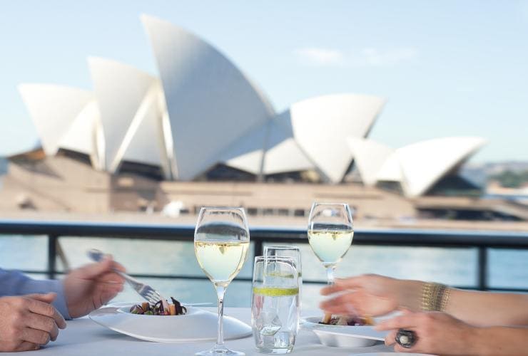 Couple having a meal and wine at Quay Restaurant in The Rocks in Sydney © Destination NSW/Penelope Beveridge