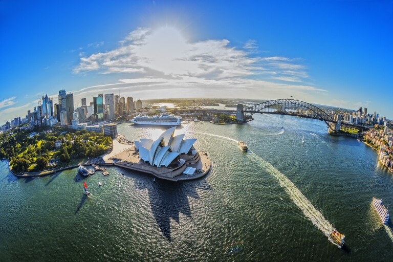 Aerial of Sydney harbour Opera House and Sydney Harbour Bridge © Destination NSW