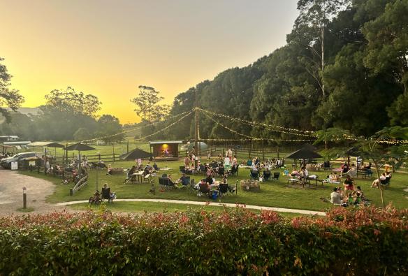 Guests watching live music at Hosanna Farmstay, Northern Rivers, New South Wales © Hosanna Farmstay
