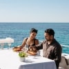 A couple dining on seafood on a boat, Rottnest Cruises, Rottnest Island, Western Australia © Tourism Australia