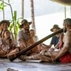 Family watching didgeridoo performance at Rainforestation Nature Park © Tourism and Events Queensland 