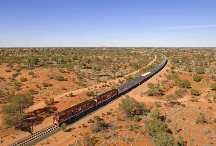 The Ghan travelling through the outback, Central Australia © Tourism NT/Steve Strike