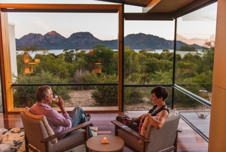 Couple watching the sunset at Saffire Freycinet, Freycinet, TAS © Supplied Courtesy of Saffire Freycinet
