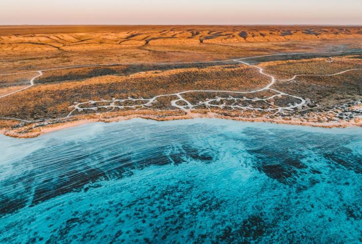Aerial view of the bright blue ocean along the coast of Francois Peron National Park, Shark Bay World Heritage Area, Western Australia © Tourism Australia / Tourism Western Australia