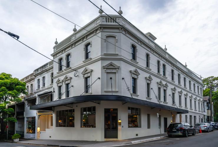 The exterior of a boutique hotel and restaurant on a street corner The Grand National by Saint Peter, Sydney, New South Wales © Saint Peter