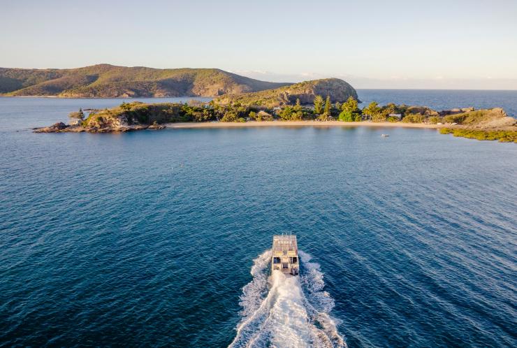 Aerial of boat going to Pumpkin Island, Capricorn, QLD © Tourism and Events Queensland