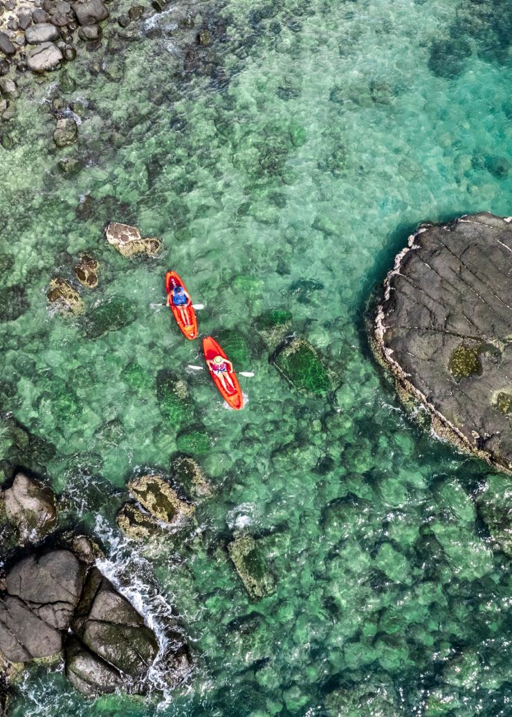 Aerial of kayaking at Banubanu Beach Retreat, Bremer Island, NT © Tourism Australia