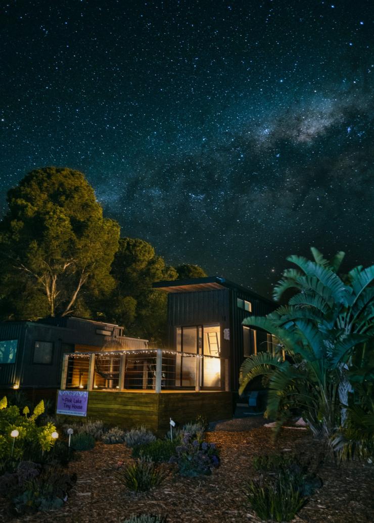 Exterior of a cabin beneath a blanket of stars, Pink Lake Tiny House, Clare Valley, South Australia © South Australian Tourism Commission