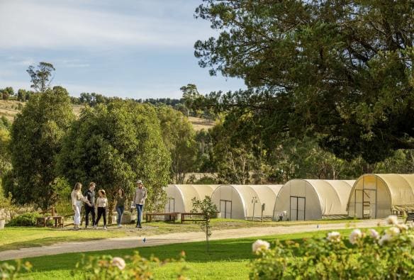 A group of people on a tour through a garden, Jurlique, Biggs Flat, South Australia © Tourism Australia