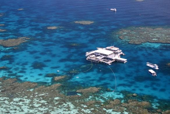 Aerial view of the Quicksilver Pontoon over Agincourt Reef, Great Barrier Reef, Queensland © Tourism Port Douglas and Daintree