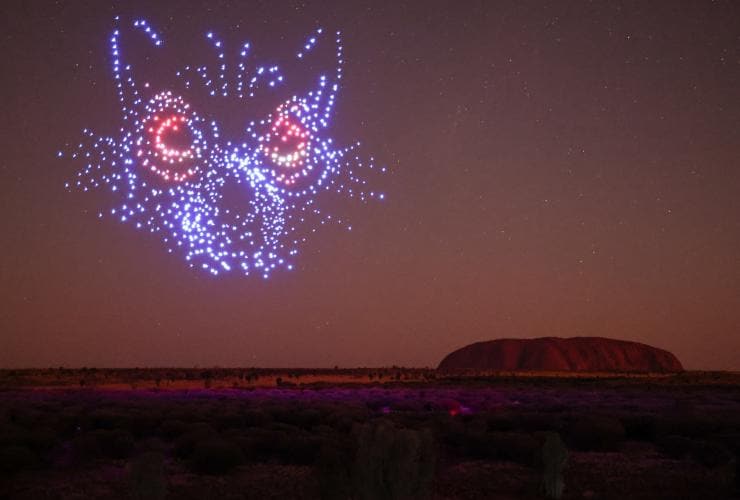 Wintjiri Wiru, Uluru-Kata Tjuta National Park, NT © Getty Images/Voyages Indigenous Tourism Australia. Anangu hold the Mala story, from Kaltukatjara to Uluru, through a drone, sound and light show designed and produced by RAMUS