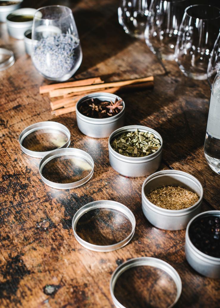 Jars of herbs and spices used in different types of gin at Four Pillars Gin Distillery, Yarra Valley, Victoria © Tourism Australia