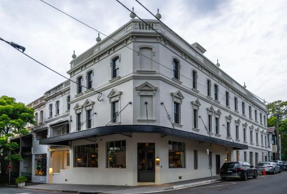 The exterior of a boutique hotel and restaurant on a street corner The Grand National by Saint Peter, Sydney, New South Wales © Saint Peter