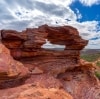A red rock formation overlooking a river and bushland at Nature’s Window, Kalbarri National Park, Western Australia © Australia’s Coral Coast